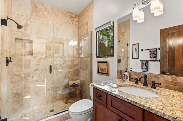 14 Avenida Sebastian, Santa Fe, NM 87506 - bathroom with toilet, vanity, and a shower stall
