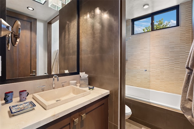 20 Rising Moon, Santa Fe, NM 87506 - full bathroom with vanity, tiled shower / bath combo, and toilet