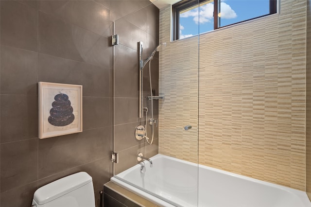 20 Rising Moon, Santa Fe, NM 87506 - full bath featuring tile walls, toilet, and tiled shower / bath