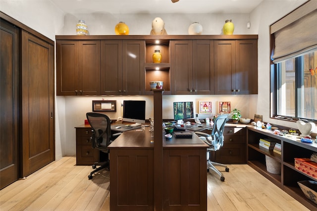 20 Rising Moon, Santa Fe, NM 87506 - office space featuring light wood-type flooring and built in desk