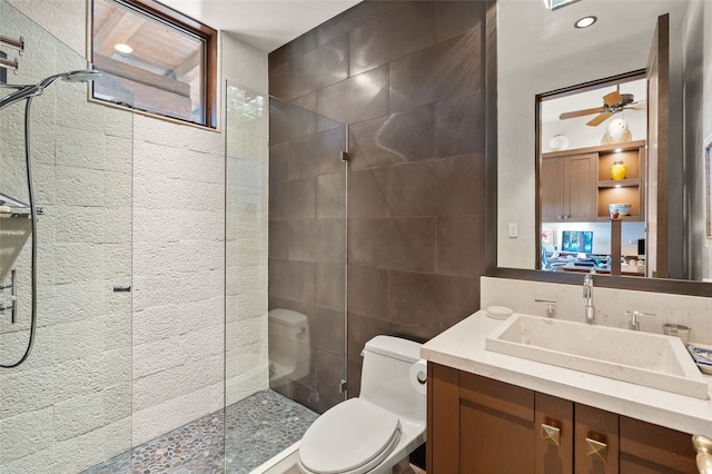 20 Rising Moon, Santa Fe, NM 87506 - full bath featuring toilet, walk in shower, vanity, ceiling fan, and tile walls