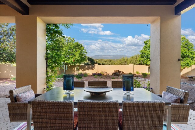 20 Rising Moon, Santa Fe, NM 87506 - fenced backyard with outdoor dining space and a patio