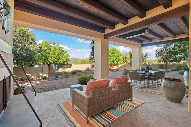 20 Rising Moon, Santa Fe, NM 87506 - fenced backyard featuring a patio and outdoor dining space