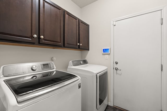 5910 Monte Rosa St, Santa Fe, NM 87507 - washroom featuring washer and clothes dryer and cabinet space