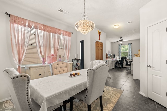 5910 Monte Rosa St, Santa Fe, NM 87507 - dining room featuring a chandelier, an office area, a ceiling fan, baseboards, and dark tile patterned floors