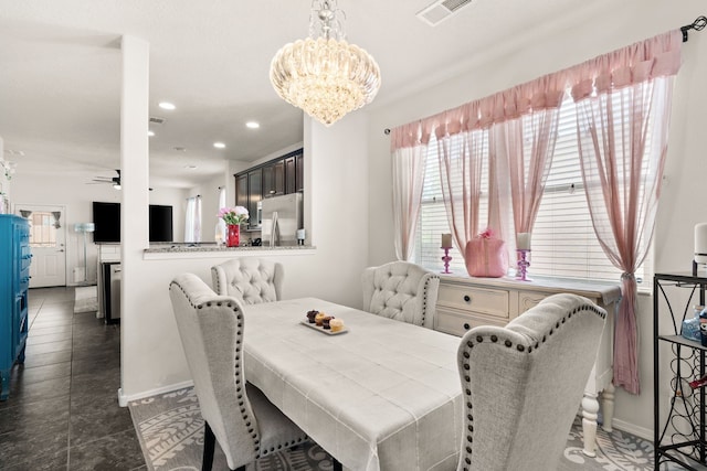 5910 Monte Rosa St, Santa Fe, NM 87507 - dining space featuring a chandelier, recessed lighting, ceiling fan, baseboards, and tile patterned floors