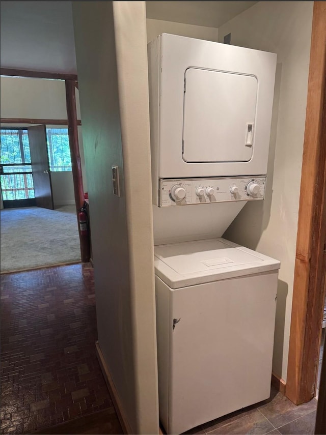 7 W Meadow Ln, Sapello, NM 87745 - washroom with stacked washer and clothes dryer