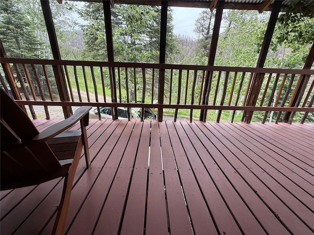 7 W Meadow Ln, Sapello, NM 87745 - deck featuring a forest view