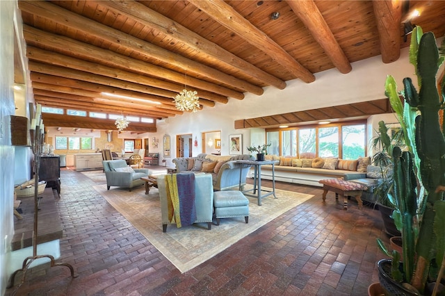 559 Camino Del Monte Sol, Santa Fe, NM 87505 - living room with wood ceiling with exposed beams, brick floors, and a chandelier