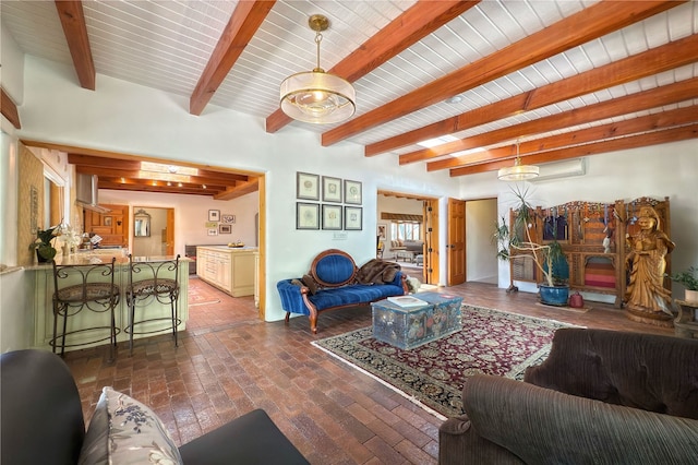 559 Camino Del Monte Sol, Santa Fe, NM 87505 - living room featuring brick floors and beamed ceiling