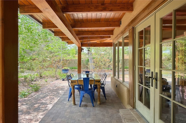 559 Camino Del Monte Sol, Santa Fe, NM 87505 - view of patio featuring french doors and outdoor dining space