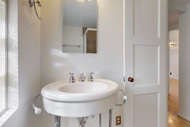 1765 38th St, Los Alamos, NM 87544 - bathroom featuring wood finished floors and a sink