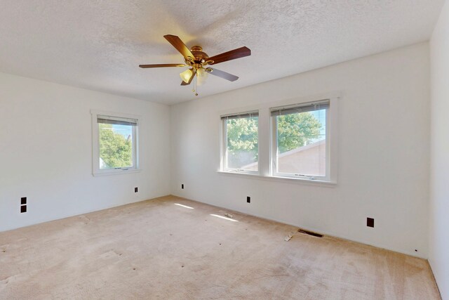 1765 38th St, Los Alamos, NM 87544 - carpeted spare room featuring ceiling fan and a textured ceiling