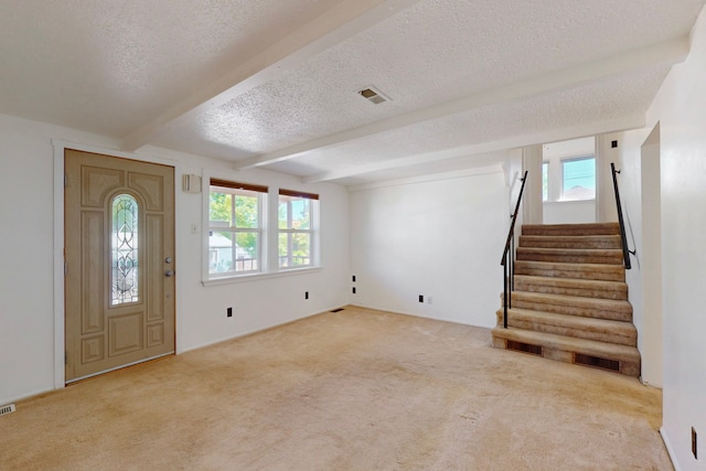 1765 38th St, Los Alamos, NM 87544 - carpeted entryway with a textured ceiling, beam ceiling, and stairs