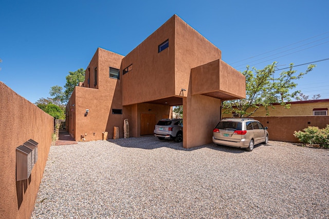 543 Juanita Unit B, Santa Fe, NM 87501 - rear view of house with stucco siding