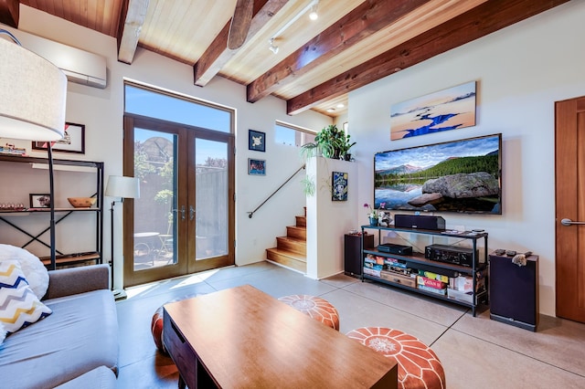 543 Juanita Unit B, Santa Fe, NM 87501 - tiled living room with french doors, stairs, and wood ceiling with exposed beams