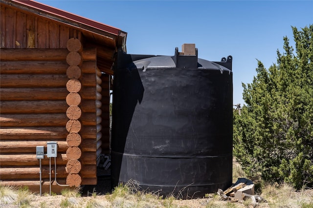 208A Camino Los Abuelos, Santa Fe, NM 87508 - exterior view of log siding