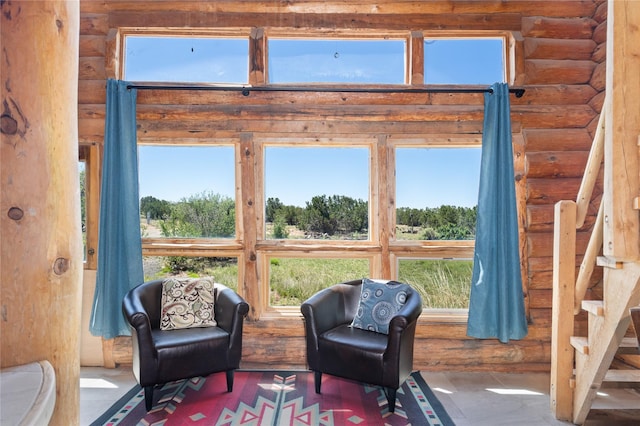 208A Camino Los Abuelos, Santa Fe, NM 87508 - living area with rustic walls and stairway
