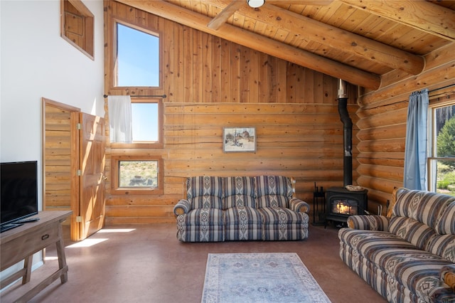 208A Camino Los Abuelos, Santa Fe, NM 87508 - living room featuring rustic walls, a wood stove, wood ceiling with exposed beams, a high ceiling, and finished concrete flooring