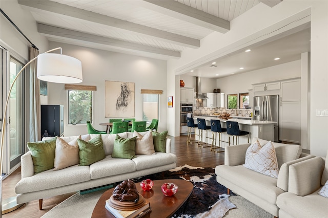 11 W Avenida Sebastian, Santa Fe, NM 87506 - living room featuring wood finished floors, beamed ceiling, and recessed lighting