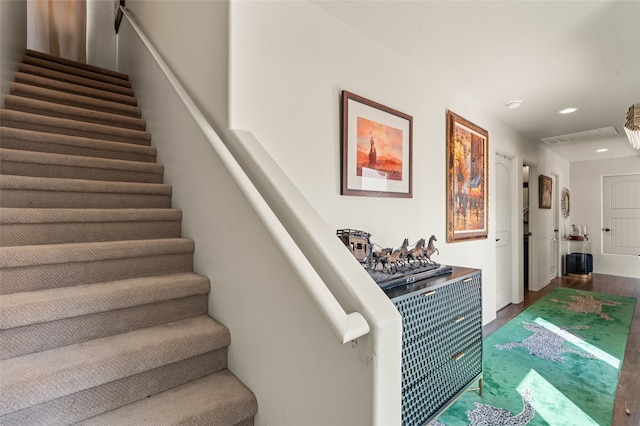 11 W Avenida Sebastian, Santa Fe, NM 87506 - stairway featuring wood finished floors and recessed lighting