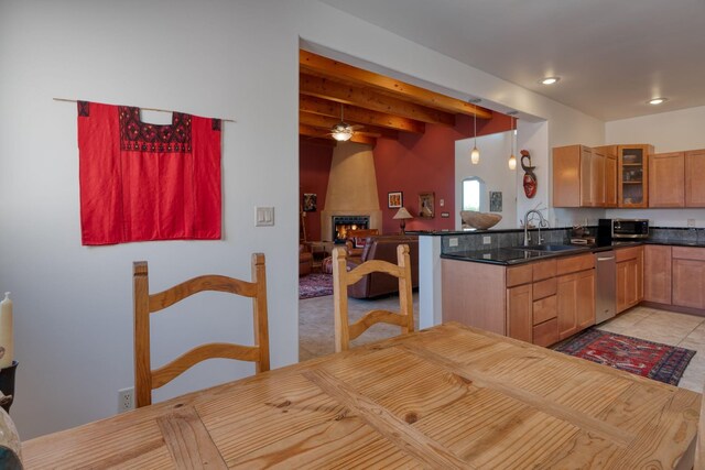 301 Camino De Las Huertas, Placitas, NM 87043 - kitchen with a sink, appliances with stainless steel finishes, dark countertops, glass insert cabinets, and a ceiling fan