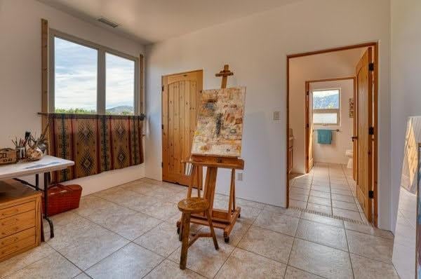 301 Camino De Las Huertas, Placitas, NM 87043 - foyer entrance featuring light tile patterned floors