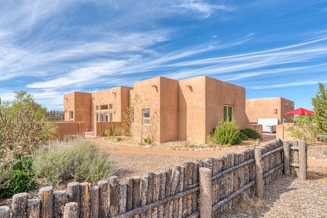 301 Camino De Las Huertas, Placitas, NM 87043 - view of front facade featuring stucco siding