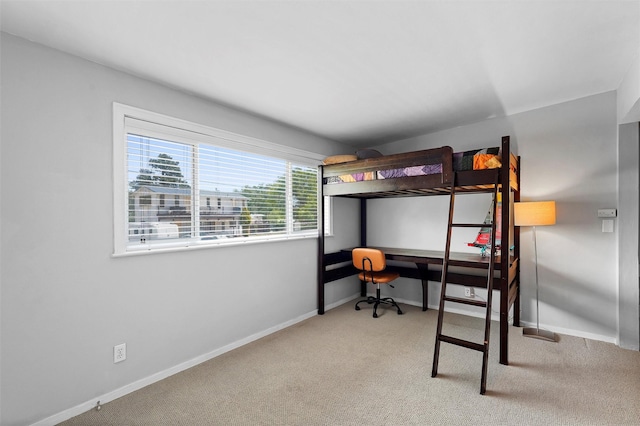 3177 Nickel Unit A, Los Alamos, NM 87544 - bedroom with carpet floors, an office area, and baseboards