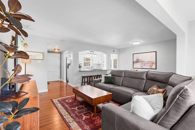 3177 Nickel Unit A, Los Alamos, NM 87544 - living area featuring hardwood / wood-style floors, baseboards, and ceiling fan