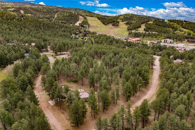 50 Jackson Hole Rd, Angel Fire, NM 87710 - view of property location featuring a heavily wooded area and mountains
