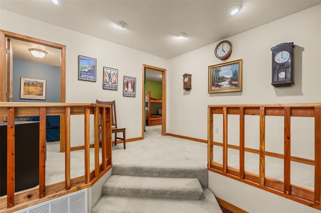 50 Jackson Hole Rd, Angel Fire, NM 87710 - staircase with carpet and baseboards