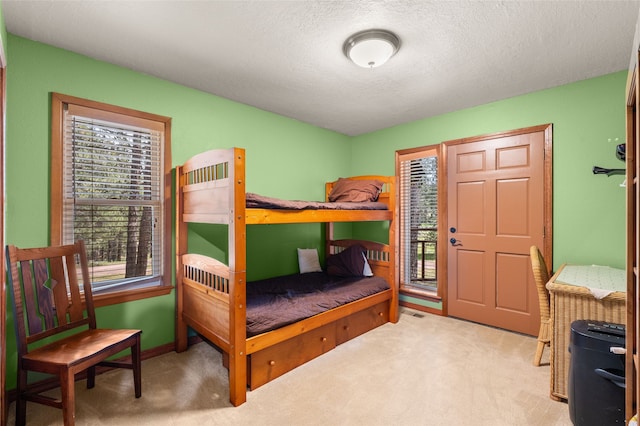 50 Jackson Hole Rd, Angel Fire, NM 87710 - bedroom with carpet floors and a textured ceiling