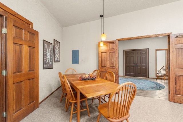 50 Jackson Hole Rd, Angel Fire, NM 87710 - dining space with electric panel and lofted ceiling