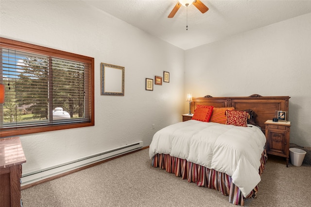 50 Jackson Hole Rd, Angel Fire, NM 87710 - bedroom featuring carpet floors, a baseboard radiator, vaulted ceiling, and a ceiling fan
