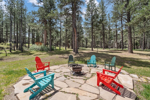 50 Jackson Hole Rd, Angel Fire, NM 87710 - view of patio / terrace featuring a fire pit