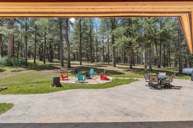 50 Jackson Hole Rd, Angel Fire, NM 87710 - view of patio / terrace featuring outdoor dining area and an outdoor fire pit