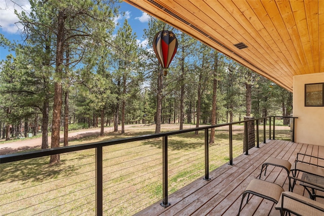 50 Jackson Hole Rd, Angel Fire, NM 87710 - wooden deck featuring view of scattered trees