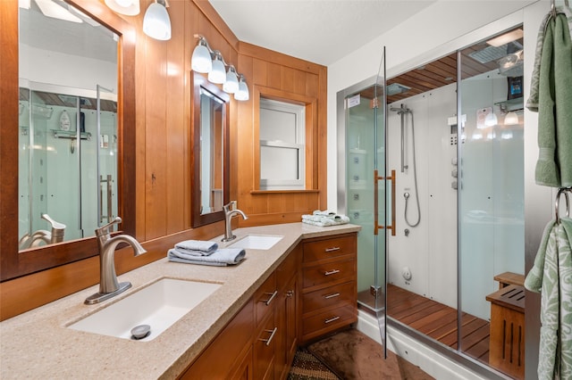 50 Jackson Hole Rd, Angel Fire, NM 87710 - bathroom featuring a shower stall and double vanity
