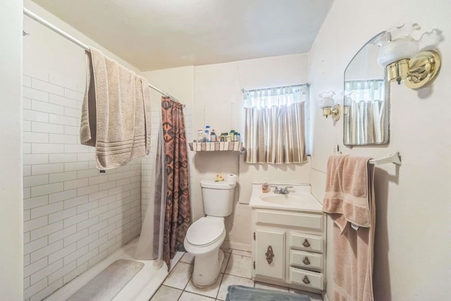 1619 Brae St, Santa Fe, NM 87505 - bathroom featuring tile patterned floors, toilet, vanity, and a tile shower