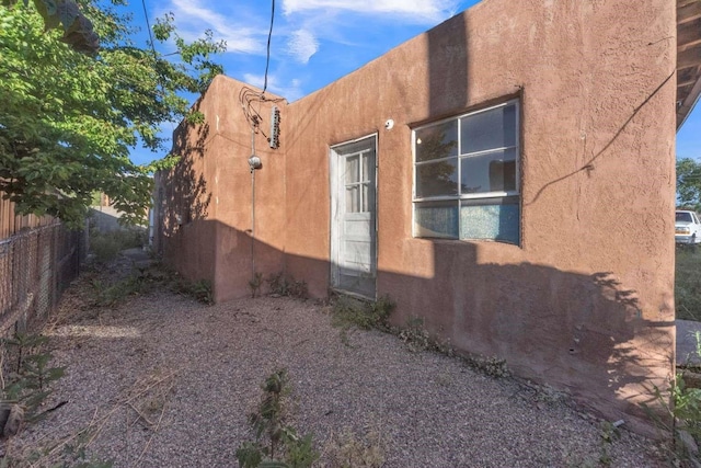 1619 Brae St, Santa Fe, NM 87505 - view of side of property featuring stucco siding