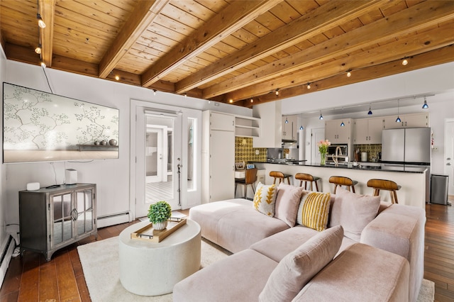 309 Lomita St, Santa Fe, NM 87505 - living room featuring dark wood-style floors, a baseboard heating unit, and wood ceiling with exposed beams