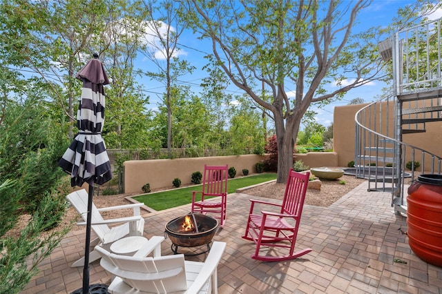 309 Lomita St, Santa Fe, NM 87505 - view of patio with an outdoor fire pit