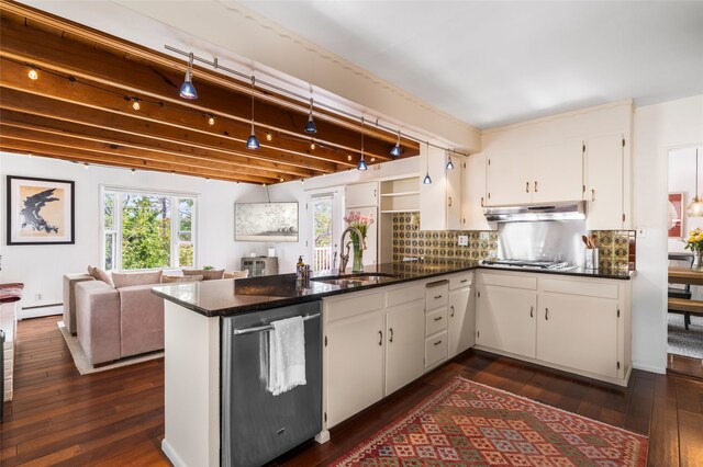 309 Lomita St, Santa Fe, NM 87505 - kitchen featuring appliances with stainless steel finishes, a sink, a peninsula, a baseboard heating unit, and dark wood-type flooring