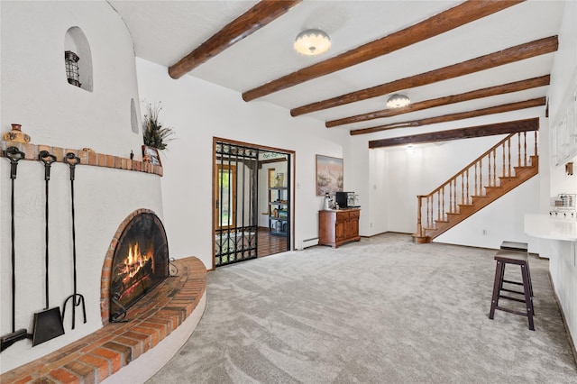 1905 Camino Redondo, Los Alamos, NM 87544 - carpeted living room featuring beam ceiling, stairway, a baseboard radiator, and a fireplace