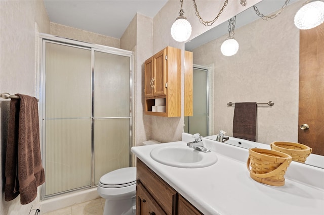 1905 Camino Redondo, Los Alamos, NM 87544 - bathroom with a stall shower, vanity, toilet, and tile patterned flooring