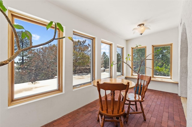 1905 Camino Redondo, Los Alamos, NM 87544 - dining room featuring brick floors and healthy amount of natural light
