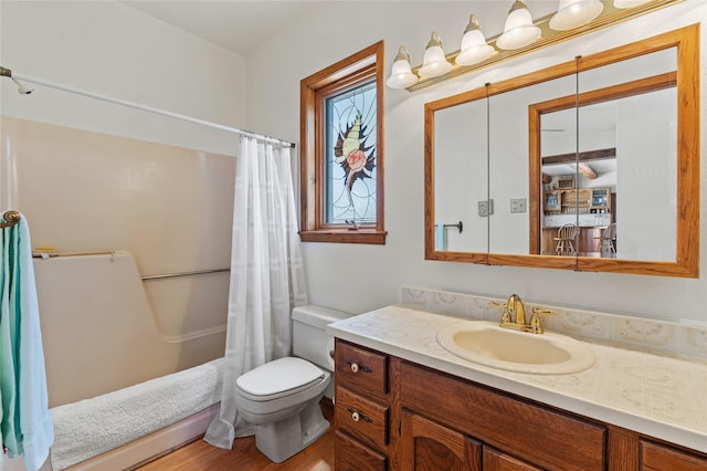 1905 Camino Redondo, Los Alamos, NM 87544 - full bath with shower / tub combo, vanity, toilet, and wood finished floors