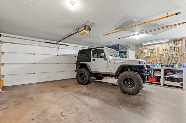 1905 Camino Redondo, Los Alamos, NM 87544 - garage featuring a garage door opener