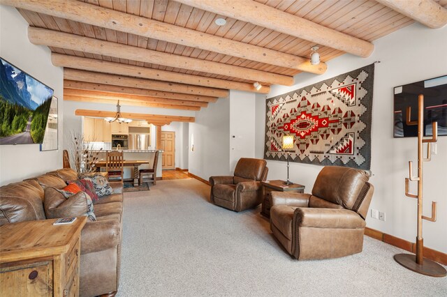 3101 Old Pecos Trl Unit 101, Santa Fe, NM 87505 - living room featuring wood ceiling with exposed beams, carpet, baseboards, and a chandelier